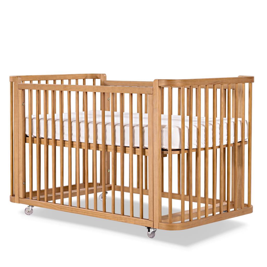 Spindle crib top